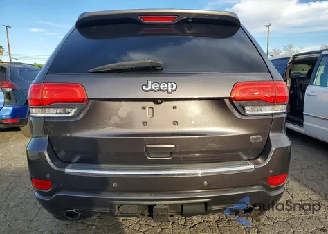 2014 Jeep Grand Cherokee Overland из США, поврежденный, VIN 1C4RJECT4EC201722